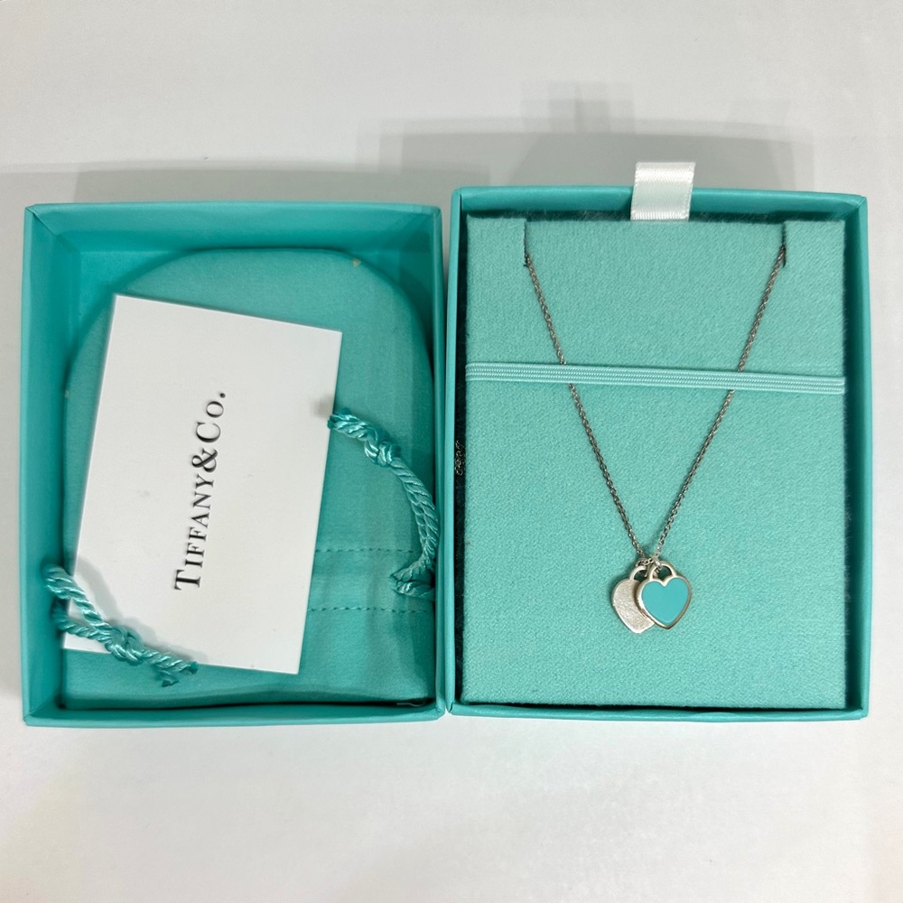 Tifany and Co. Tiffany blue double heart tag pendant, In silver.